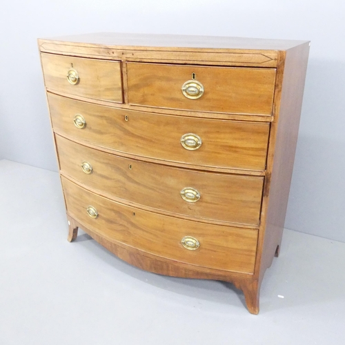 2115 - A Georgian mahogany bow-front chest of two short and three long drawers. 108x106x54cm.