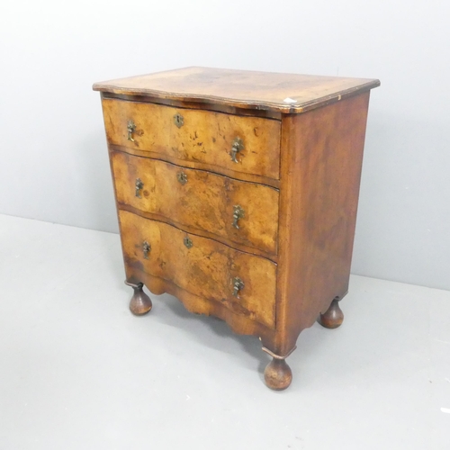 2118 - A Queen Anne style crossbanded walnut veneered serpentine fronted chest of three drawers. 61x71x40cm... 