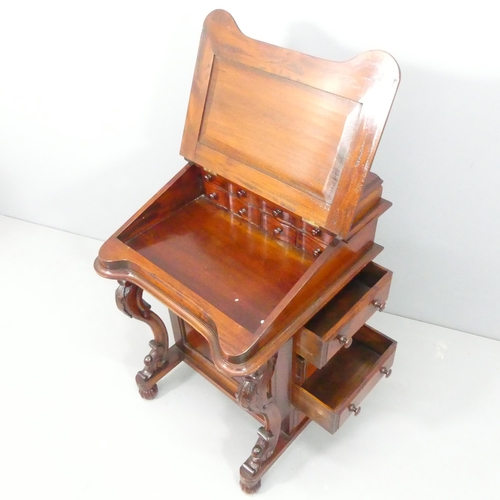 2123 - A reproduction mahogany davenport. 56x84x56cm..