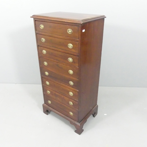 2127 - A 19th century crossbanded mahogany and satinwood strung narrow chest of eight drawers, raised on br... 