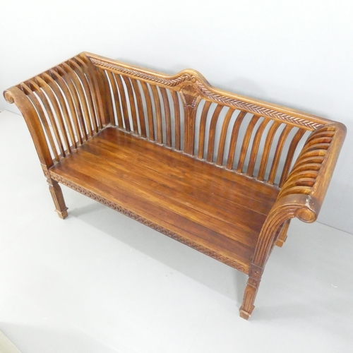 2145 - A modern hardwood continental style window seat / bench. Overall 155x94x56cm, seat 120x50x53cm.