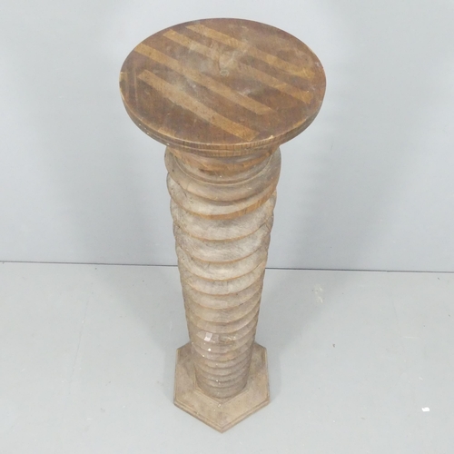 2157 - A French elm spiral turned column on hexagonal base. 33x128cm.