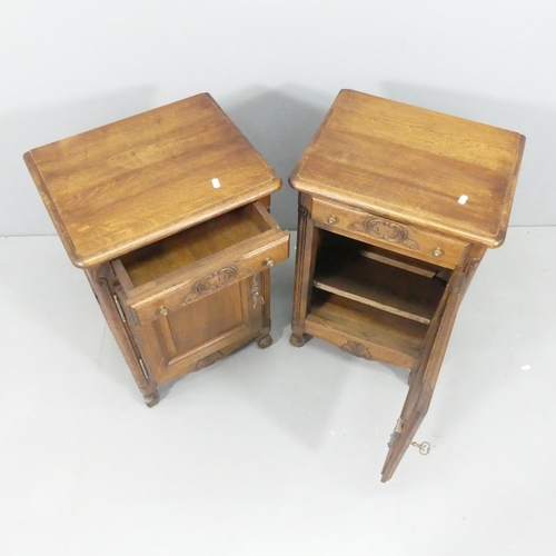 2162 - A pair of French oak pot-cupboards, with single frieze drawer and carved and panelled decoration. Ea... 