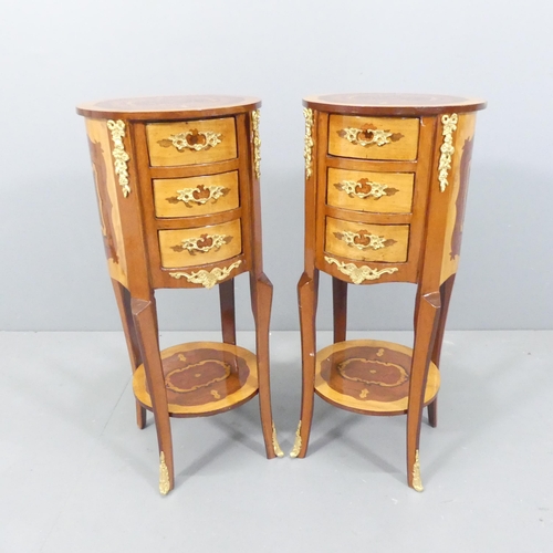 2172 - A pair of Italianate walnut and mahogany two-tier drum bedside tables, with inlaid decoration, three... 