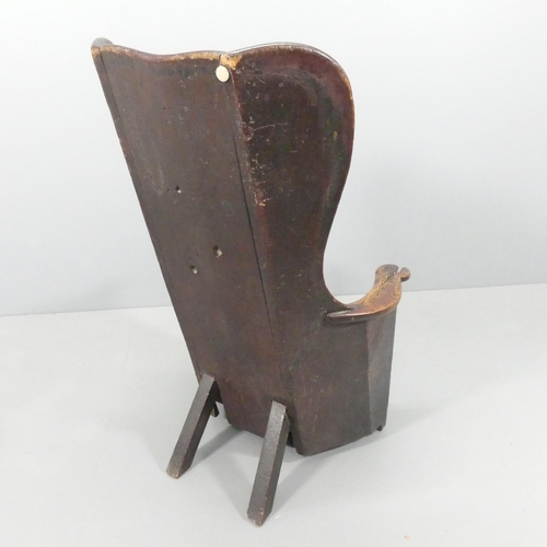 2198 - An 18th century elm lambing chair, with single drawer beneath seat. Overall 74x118x65cm, seat 51x33x... 