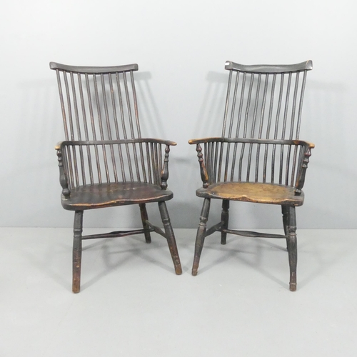 2204 - Two similar ash and elm-seated Welsh comb-back arm chairs.