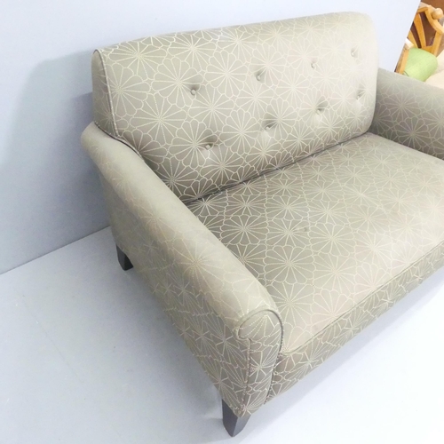 2210 - A contemporary two-seater buttonback upholstered sofa. Overall 155x80x88cm, seat 125x44x58cm.