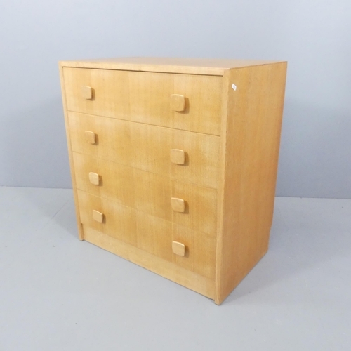 2050 - A mid-century light oak chest of four long drawers, with label for Herbert E. Gibbs ltd. to back. 77... 