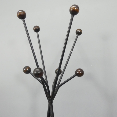 2059 - A mid-century atomic hat and coat stand in the manner of Roger Feraud, with wooden ball ends on wrou... 