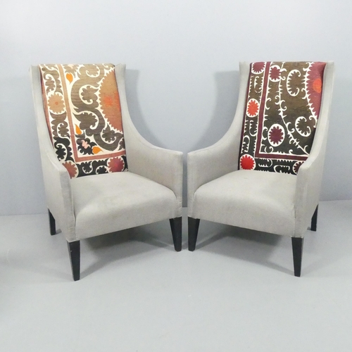 2062 - ANDREW MARTIN - a pair of contemporary Pluto lounge chairs. Overall 73x116x80cm, seat 58x40x55cm.