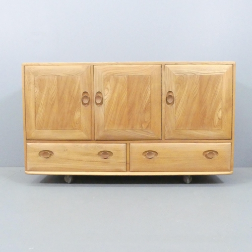 2063 - ERCOL - A mid-century Windsor model 468 sideboard, with three cupboard doors and drawers under. Make... 