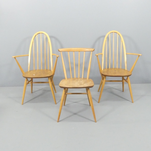 2064 - A pair of Ercol Quaker carver chairs, and a stickback dining chair. (3).