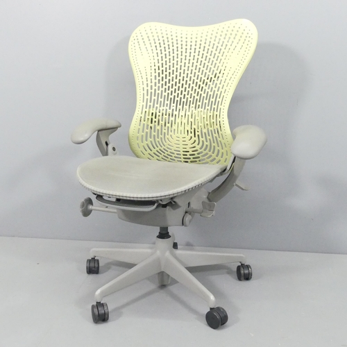 2067 - A Herman Miller ergonomic swivel desk chair, with moulded maker's marks.