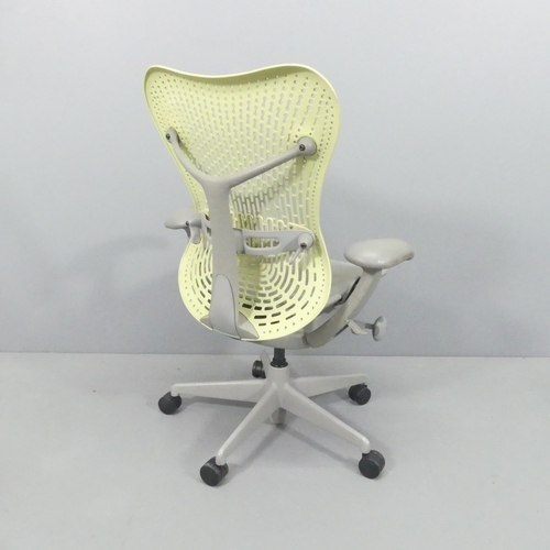 2067 - A Herman Miller ergonomic swivel desk chair, with moulded maker's marks.