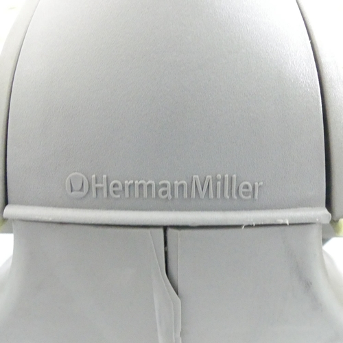 2067 - A Herman Miller ergonomic swivel desk chair, with moulded maker's marks.