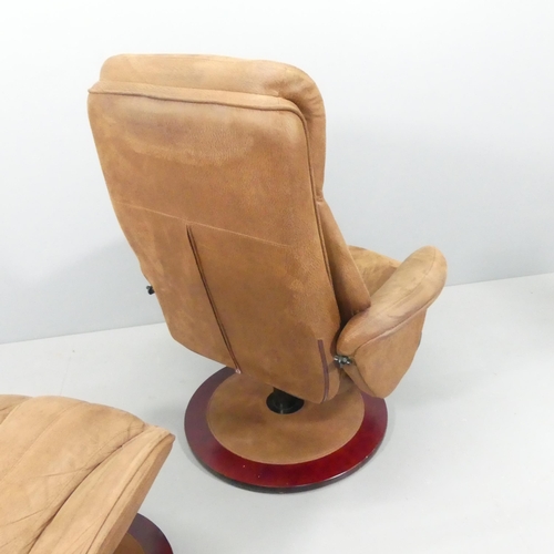 2071 - A mid-century design suede upholstered reclining swivel lounge chair with matching footstool, in the... 