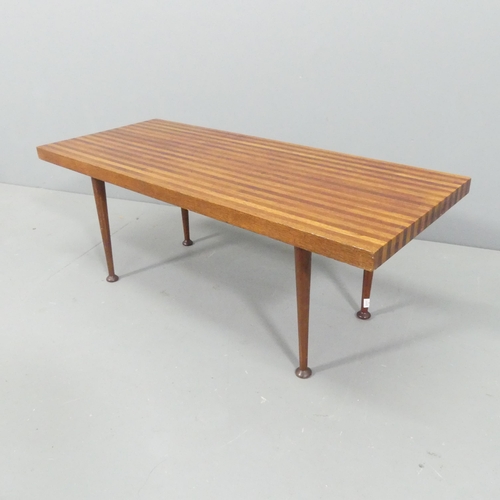 2074 - A mid-century Danish design coffee table of laminated block wood construction. 88x33x37cm.