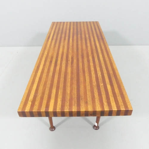 2074 - A mid-century Danish design coffee table of laminated block wood construction. 88x33x37cm.