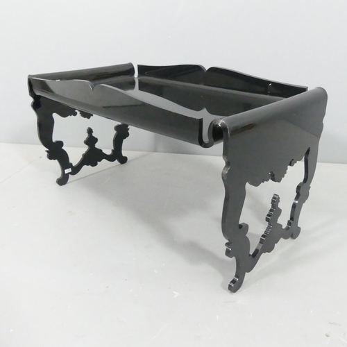 2076 - A 1990s Neoclassical style black acrylic coffee table. 69x37x37cm.