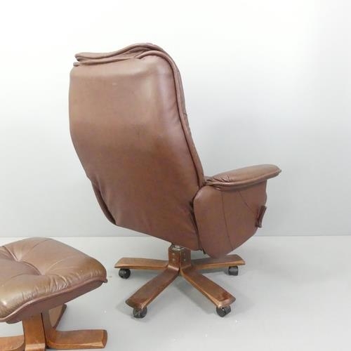 2079 - SKOGHAUG INDUSTRI - A mid-century Norwegian brown-leather upholstered reclining swivel lounge chair,... 