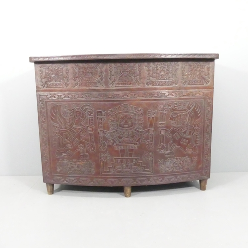 2082 - A mid-century Peruvian tooled leather clad bar, with embossed Aztec design. 143x109x61cm