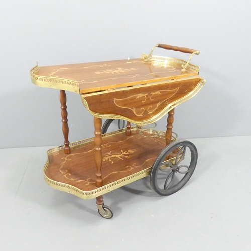 2084 - An Italianate mid-century design two-tier drinks trolley with marquetry decoration. 77x71x50cm