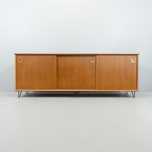 2095 - DYRLUND - A mid-century Danish teak sideboard, with three sliding doors and maker's label to back. 1... 