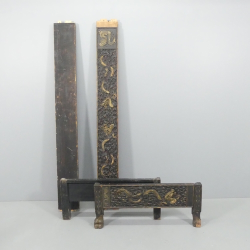 2222 - A Chinese black and gold painted daybed frame, with carved dragon decoration. Overall size approxima... 