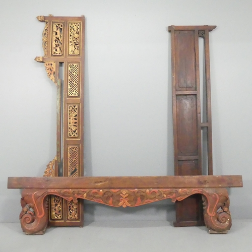 2223 - Three Chinese elm bed panels, with carved, pierced and painted decoration.