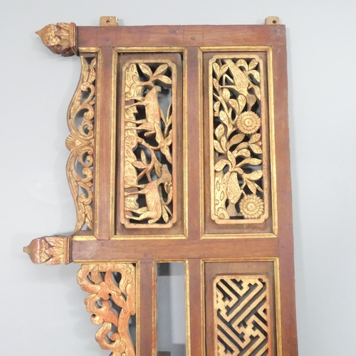 2223 - Three Chinese elm bed panels, with carved, pierced and painted decoration.