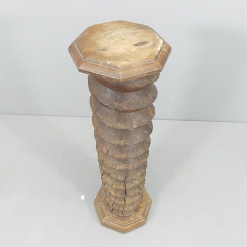 2224 - A French elm spiral turned column. 31x104cm