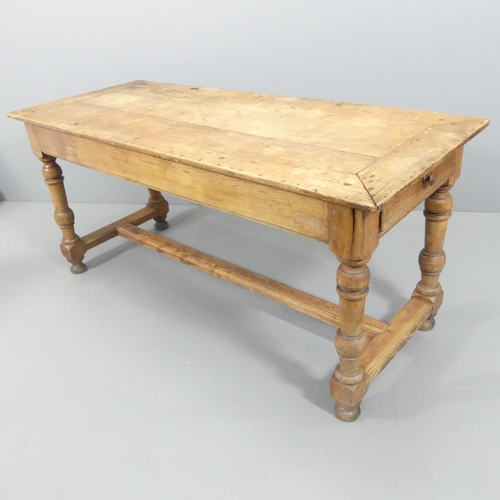 2236 - A French cherrywood plank top dining table, with two end-frieze drawers, turned legs and H shaped st... 