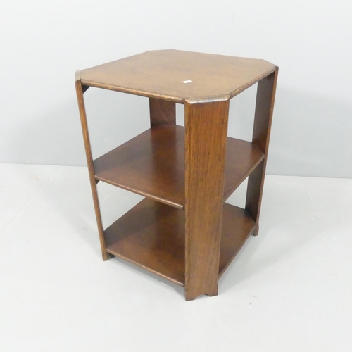 2239 - An early 20th century oak three tier side table, in the manner of Heals. 47x63cm