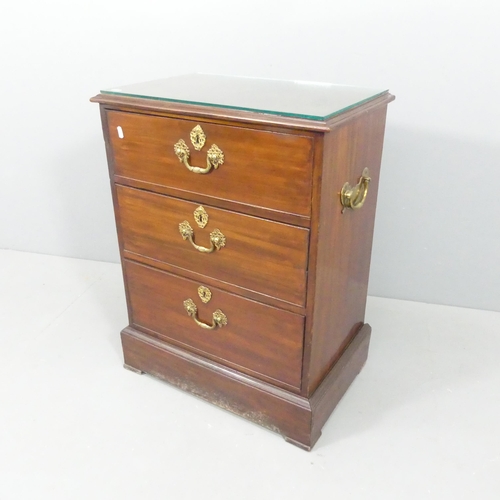 2242 - A 19th century style mahogany three-drawer chest, with brass mounts and glass top. 59x79x38cm.