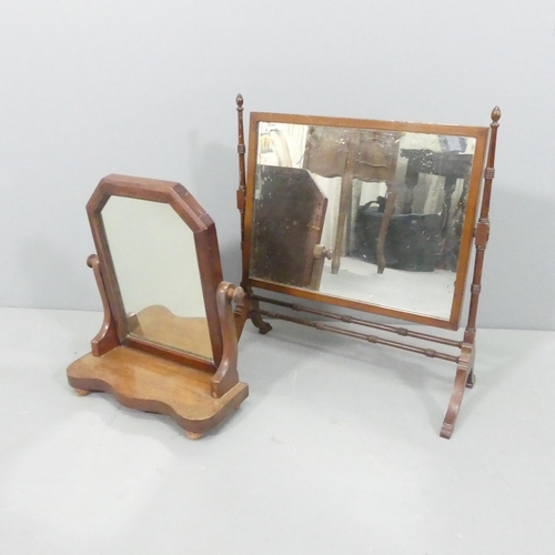 2244 - Two mahogany framed swing-toilet mirrors. Largest 52x57cm.