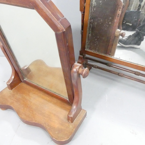 2244 - Two mahogany framed swing-toilet mirrors. Largest 52x57cm.