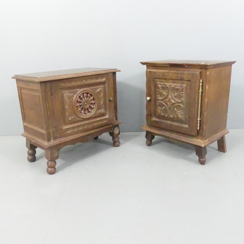 2255 - Two similar Breton French oak pot cupboards, with carved decoration. Largest 61x57x32cm.