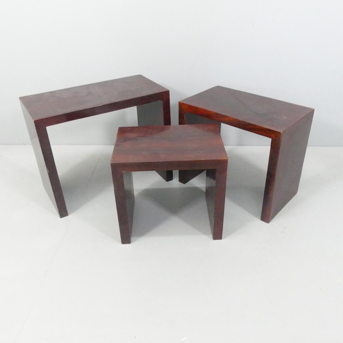 2256 - A modern rosewood veneered nest of three rectangular occasional tables. Largest 60x49x30cm.