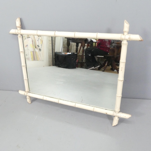 2263 - An antique faux bamboo-framed rectangular wall mirror. 85x64cm.