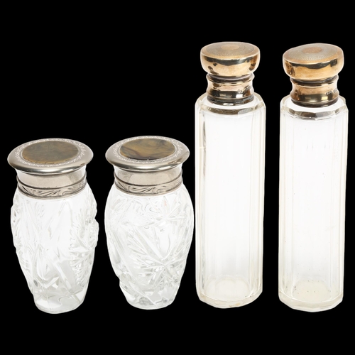 1089 - Pair of tall cut-glass jars with hallmarked silver tops, height 14cm, and a pair of smaller glass ja... 