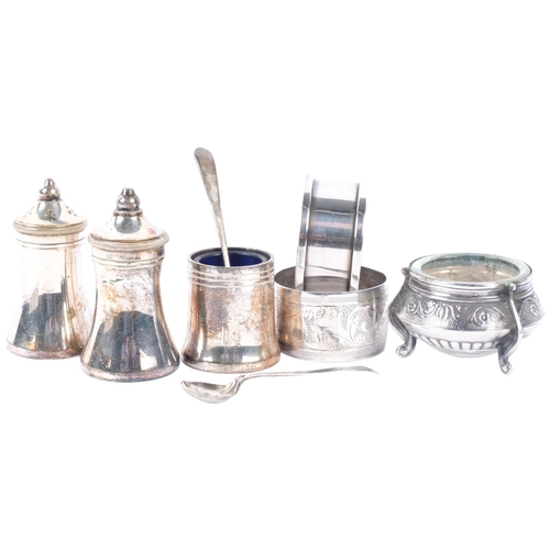 1046 - 2 silver napkin rings, Russian mustard pot, and a silver plated cruet set