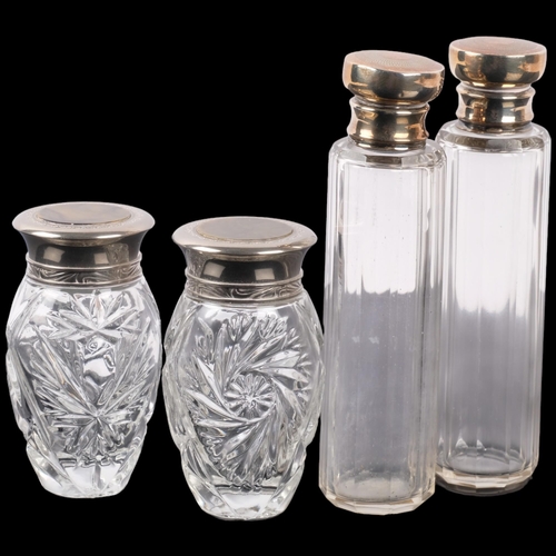 1089 - Pair of tall cut-glass jars with hallmarked silver tops, height 14cm, and a pair of smaller glass ja... 