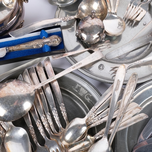 1009 - A silver plated 3-piece tea set, 18th century pewter dinner plates, and various cutlery