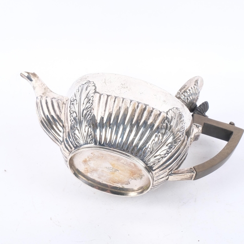 1043 - A George V silver teapot, Alexander Clark & Co Ltd, Birmingham 1912, oval form with relief embossed ... 