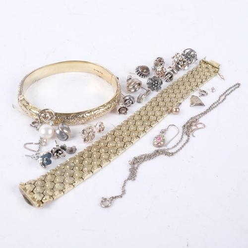 1053 - A Danish silver-gilt hinged bangle, silver earrings, and a gold plated brick link bracelet