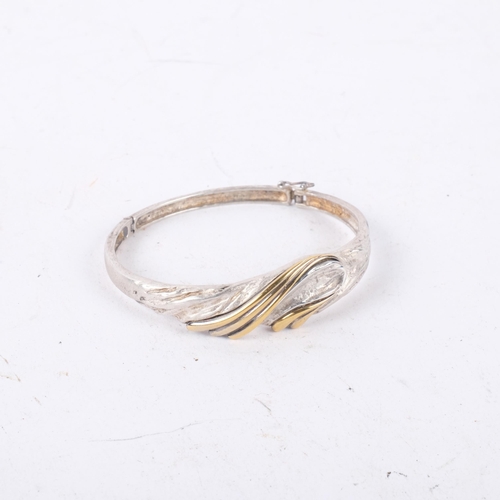 1054 - HERMANN SIERSBOL - a a Danish sterling silver and silver-gilt abstract fold hinged bangle