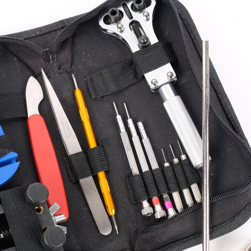 1061 - A watchmaker's starter repair kit, including jaxa style caseback opening tool, pliers, screwdrivers,... 