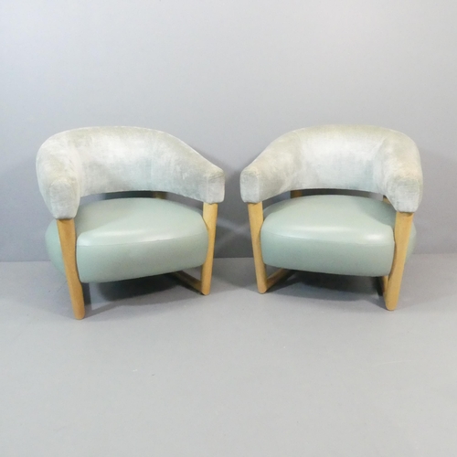 2098 - Manner of Jean Royere, a pair of green leather and velvet unholstered oak framed lounge chairs on sl... 