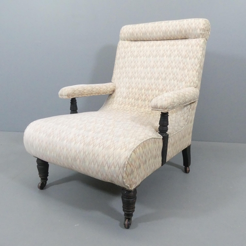 2274 - CORNELIUS V. SMITH - A Victorian country house ebonised and upholstered armchair, impressed C.V S to... 