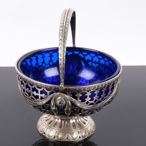 1112 - An Edwardian silver pedestal swing-handled sugar bowl, George Nathan & Ridley Hayes, Chester 1901, c... 